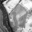 Arrat's Mill, oblique aerial view, taken from the ESE, centred on the cropmarks of an unenclosed settlement, souterrains and pit-circles.