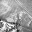 Arrat's Mill, oblique aerial view, taken from the SE, centred on the cropmarks of ring-ditches.