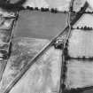 Oblique aerial view centred on the cropmarks of the rectilinear enclosure, rig and the site of the chapel, taken from the E.