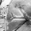 Newbigging, oblique aerial view, taken from the E, centred on the cropmarks of an unenclosed settlement.