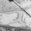 Oblique aerial view centred on the cropmarks of the unenclosed settlement and pits, taken from the S.