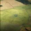 Oblique aerial view centred on the standing stone, taken from the NNE.