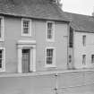 General view of the Black Bull Hotel and Harthope House, Churchgate, Moffat, from west.