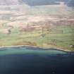 General oblique aerial view looking across Tormore, the farmsteads and field system towards Machrie Moor and the field system beyond, taken from the WNW.