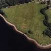 Oblique aerial view centred on the site of the chapel, taken from the W.