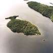 Oblique aerial view centred on Clairinsh Island with crannog adjacent, taken from the E.