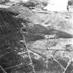 Avonhead Colliery, oblique aerial view, taken from the SE, showing the spoil heaps of four coal mines in the centre of the photograph, an area of rig underlying these spoil heaps, and peat cuttings in the bottom half.