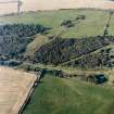 Oblique aerial view of Rough Castle centred on the remains of the Antonine wall, taken from the S.