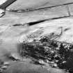 Black Hill, Lesmahagow, oblique aerial view, taken from the ENE, centred on the fort, settlement and cairn.