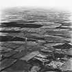 Darnrigg, Strathavon and Barleyside, oblique aerial view, taken from the SE, showing Darnrigg open-cast mine and wasteground, and Strathvon coal mine at the bottom of the photograph, and an area of rig at Barleyside running across the centre of the photograph.