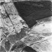 Salterhill, Drumclair and Airdriemain, oblique aerial view, taken from the N, showing Salterhill coal mine and an adjoining railway in the bottom right-hand corner of the photograph, the remains of miners' rows and a railway at Drumclair to the left, and an area of rig at Airdriemain in the bottom right-hand corner.