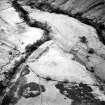 Oblique aerial view of Loss Burn centred on the remains of a farmstead, park and rig with an archaeological landscape adjacent, taken from the NW.