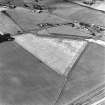 Castledykes Roman Temporary Camp, oblique aerial view, taken from the SE, centred on the cropmarks of NE corner of the camp.