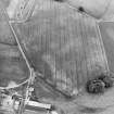 Oblique aerial view centred on the cropmarks of the Roman temporary camp and field-system, taken from the S.