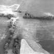 Oblique aerial view centred on the cropmarks of the eastern annexes and enclosures, taken from the W.