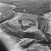 Polkemmet Colliery, oblique aerial view, taken from the NE, showing spoil heaps from the far SE edge of the coal mine in the centre of the photograph.