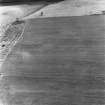 Bankhead, oblique aerial view, taken from the WSW, centred on the cropmarks of a Roman temporary camp.