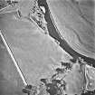 West Lindsaylands, oblique aerial view, taken from the NW, centred on the cropmarks of a fort or causewayed enclosure.