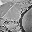 West Lindsaylands, oblique aerial view, taken from the W, centred on the cropmarks of a fort or causewayed enclosure.