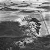 Tarbrax Shale-Oil Works and Viewfield Shale Pit, oblique aerial view, taken from the ESE, showing the massive bing of the shale-oil mine in the centre of the photograph, between a tramway, on the left, and the Tarbrax Branch of the Caledonian Railway on the right. Viewfield shale-oil mine is visible in the top right-hand corner.