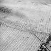 Morton Hill, oblique aerial view, taken from the NW, showing an area of rig and furrow cultivation across the photograph, and a sheepfold in the centre