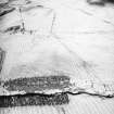 Morton Hill and Cowthrople, oblique aerial view, taken from the S, showing an area of rig and furrow cultivation across the photograph, and a ruined farmstead in the centre left.