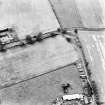 Merryless, oblique aerial view, taken from the ESE, centred on cropmarks of parts of the military camp. The last remaining building is visible in the bottom centre of the photograph.