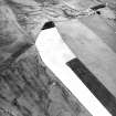 Oblique aerial view, taken from the ENE, centred on the cropmarks of the fort.