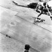 Bryland, oblique aerial view, taken from the NNE, centred on indeterminate cropmarks, and cropmarks of a possible enclosure.