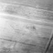 Oblique aerial view centred on the cropmarks of a possible settlement, taken from the WSW.