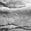 Cademuir Hill and The Whaum, oblique aerial view, taken from the NW, centred on cultivation remains including cord rig, rig and furrow, and cultivation terraces. An unenclosed platform settlement is visible in the centre left of the photograph.