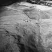 Kirkton Burn, oblique aerial view, taken from the S, centred on two scooped settlements amidst cultivation remains.