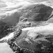 Oblique aerial view centred on the remains of rig and field banks, taken from the ENE.