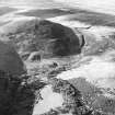 Oblique aerial view centred on the remains of rig and field banks, taken from the ESE.