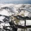 General oblique aerial view centred on the remains of the rig, with Castlelaw Hill adjacent, taken from the ESE.