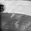 Dalachy Quarry, oblique aerial view, taken from the NE, showing the cropmarks of a souterrain and possible unenclosed settlement.