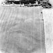 Dalachy Quarry, oblique aerial view, taken from the NNW, centred on the cropmarks of a souterrain and a possible unenclosed settlement.