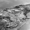 Oblique aerial view of Inchkeith Island centred on the defences, taken from the WNW.