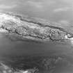 Oblique aerial view of Inchkeith Island centred on the defences, taken from the SW.