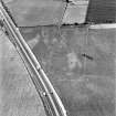 Newton, oblique aerial view, taken from the NW, centred on the cropmark of a pit alignment.