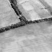 Oblique aerial view centred on the cropmarks of the pit-alignment with enclosure adjacent, taken from the WSW.