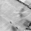 Oblique aerial view centred on the cropmarks of the pit-alignment, taken from the SSW.