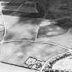 Oblique aerial view of Longthorn centred on the remains of coal pits and cropmarks, taken from the NNE.