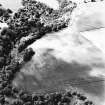 Carrington Barns, enclosure: oblique aerial view taken from the NE, centred on cropmarks of an enclosure.