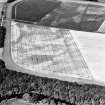 East Field, Inveresk, oblique aerial view, taken from the SE, centred on a series of cropmarks including a pit alignment.