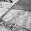 Westfield, Inveresk, oblique aerial view, taken from the SSW, centred on the cropmarks of the N terminal of the cursus monument. Cropmarks of a field-system are visible across the photograph.