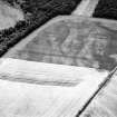 East Field, Inveresk, oblique aerial view, taken from the N, centred on the cropmarks of a pit-alignment and pits.