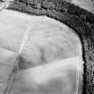 Oblique aerial view centred on the cropmarks of the pit-alignment, palisaded settlement, ring-ditches and enclosures, taken from the SW.