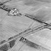Oblique aerial view centred on the cropmarks of the cursus, taken from the SW.
