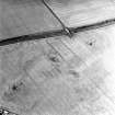Brunstane, oblique aerial view, taken from the ENE, centred on cropmarks, possibly of coal pits.